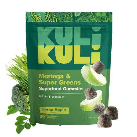 Kuli Kuli Moringa & Super Greens Superfood Gummies pouch in Green Apple flavor, shown with sugar-coated green gummies, broccoli, wheatgrass, and moringa leaves.