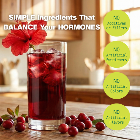 Tall iced glass of Her Power cranberry hibiscus drink with fresh cranberries; no additives, fillers, artificial sweeteners, colors, or flavors