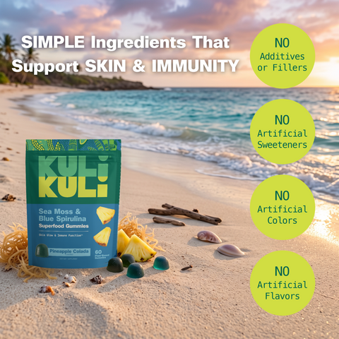 Kuli Kuli Sea Moss & Blue Spirulina gummies pouch on a sunset beach with sea moss and pineapple, beside badges reading no additives or fillers, no artificial sweeteners, no artificial colors, and no artificial flavors.