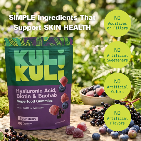 Kuli Kuli Sour Berry gummies pouch outdoors with fresh elderberries and blueberries. Simple ingredients that support skin health, with no additives, fillers, artificial sweeteners, colors, or flavors.